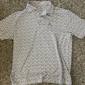 Rhoback men’s golf polo with cowboy hat and boots